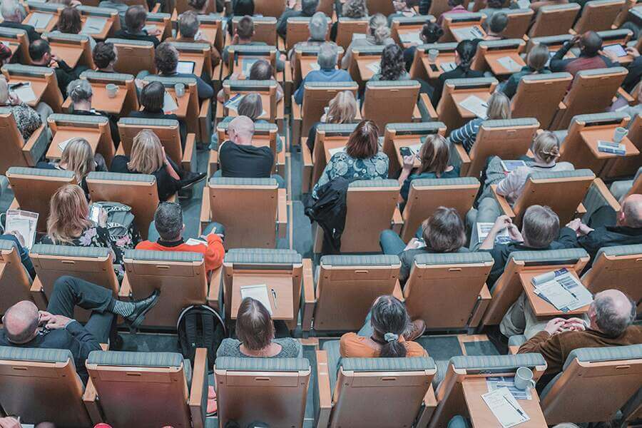 Overhead shot of student at a university lecture